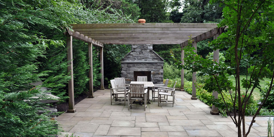 pergola with a fireplace